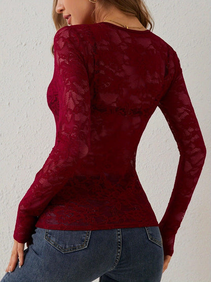 Lace bodysuit with long sleeves and deep neckline