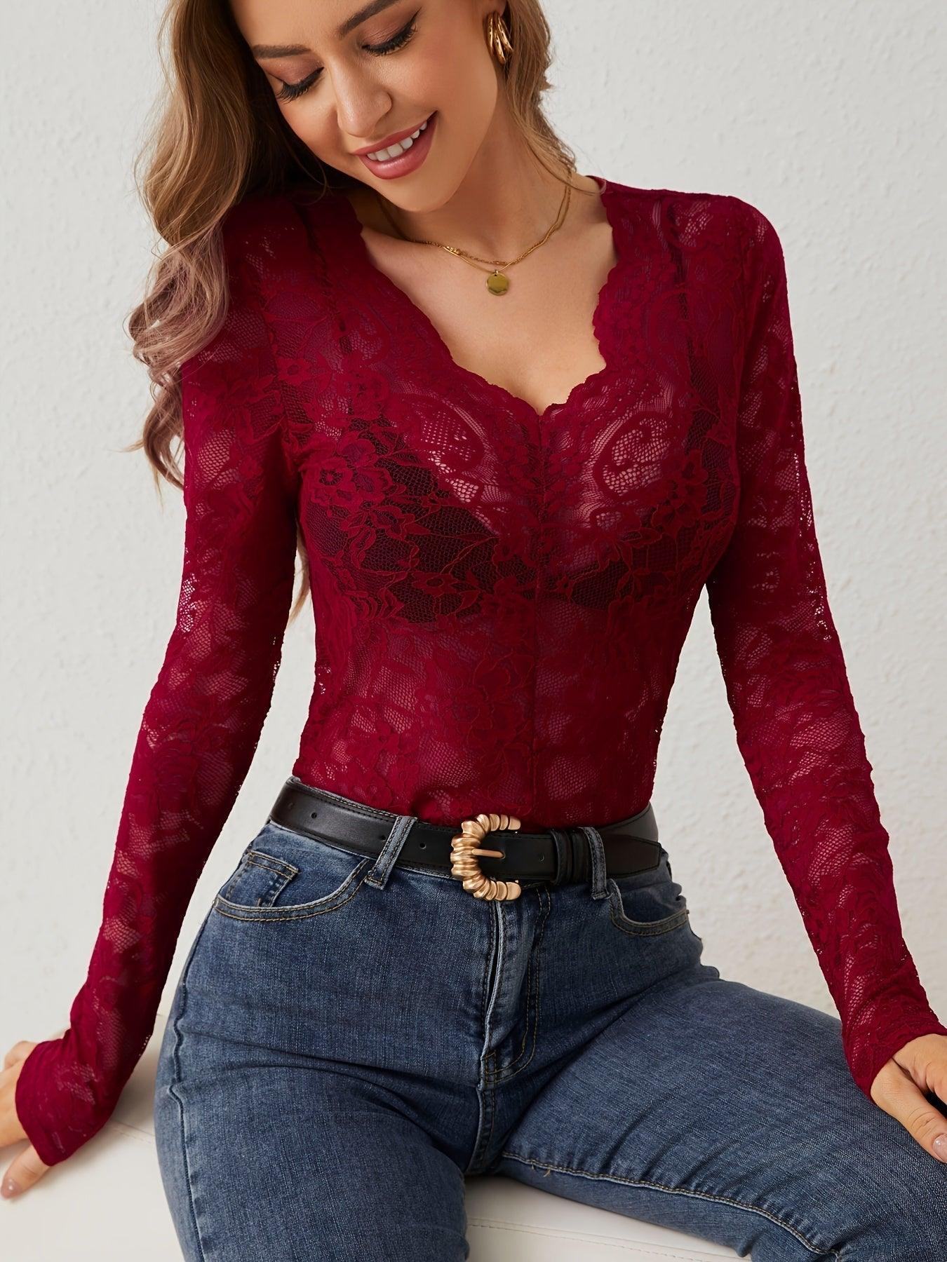 Lace bodysuit with long sleeves and deep neckline