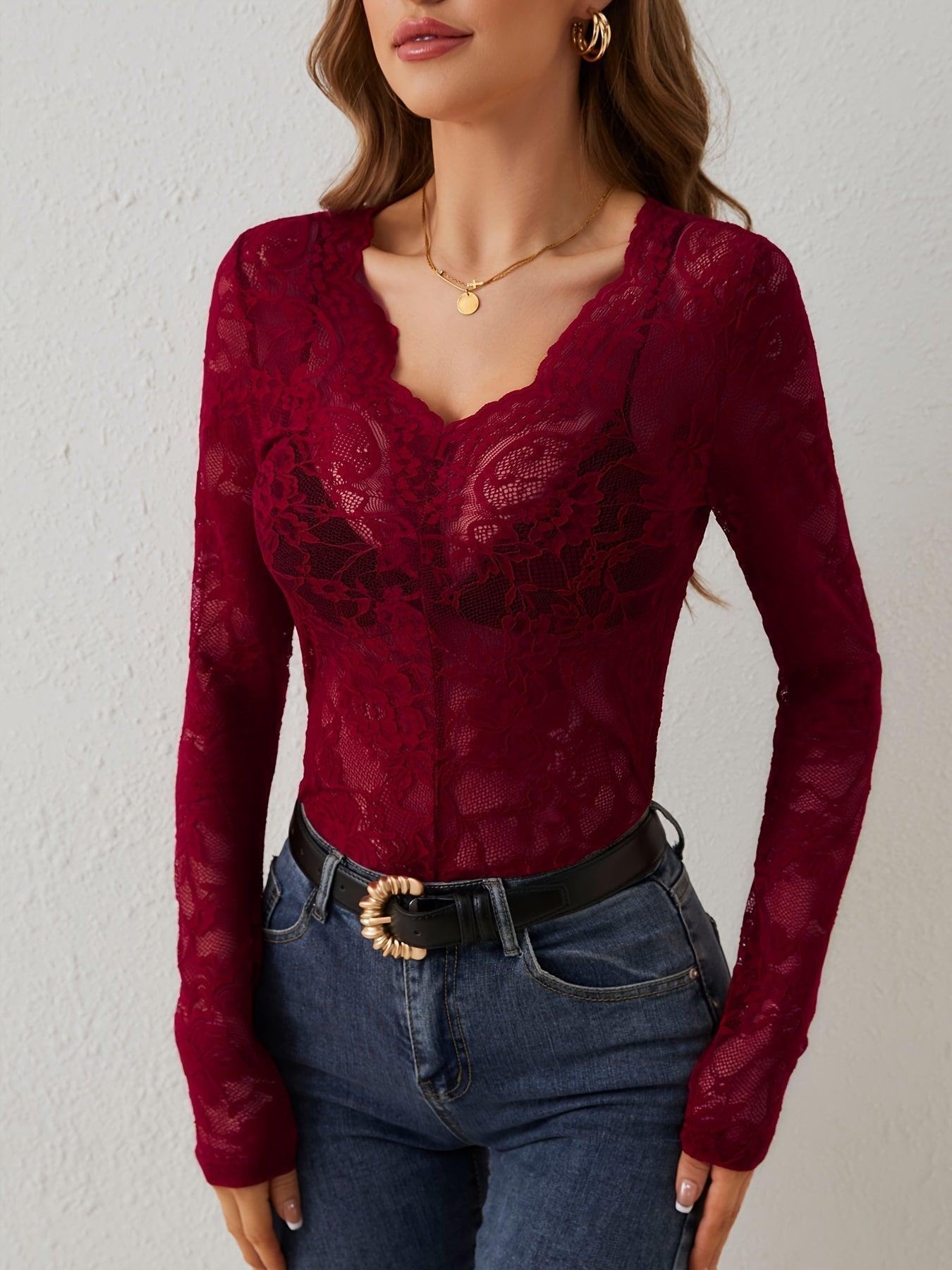 Lace bodysuit with long sleeves and deep neckline
